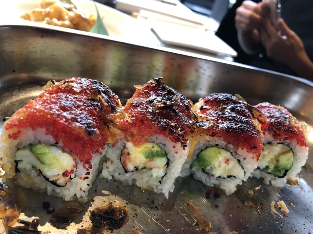 four sushi rolls lined up